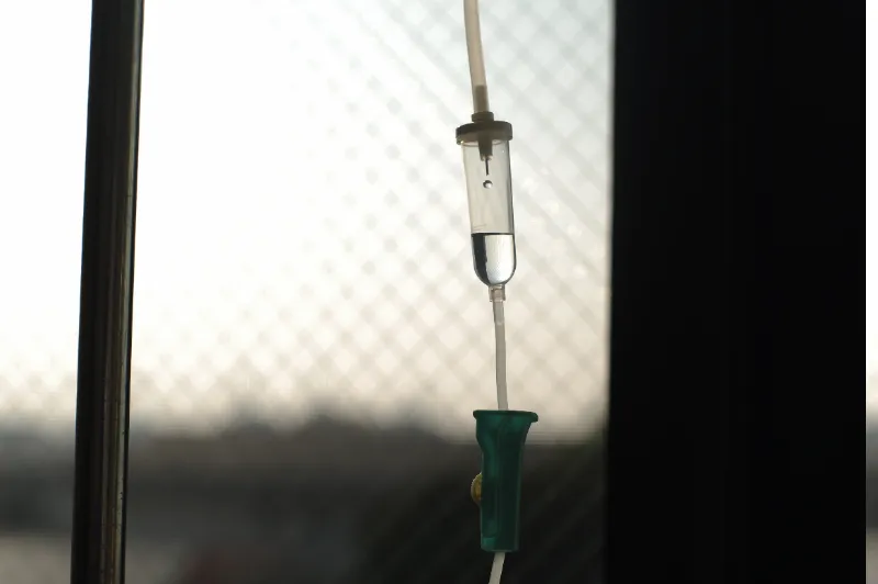 A close-up photo of an IV in a hospital, possibly showing signs of IV filtration injury