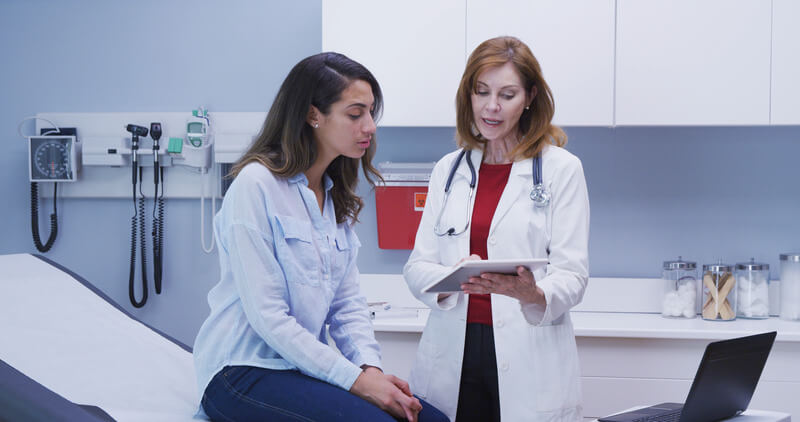A woman seeking a second opinion from another doctor due to a misdiagnosis of ovarian cyst.