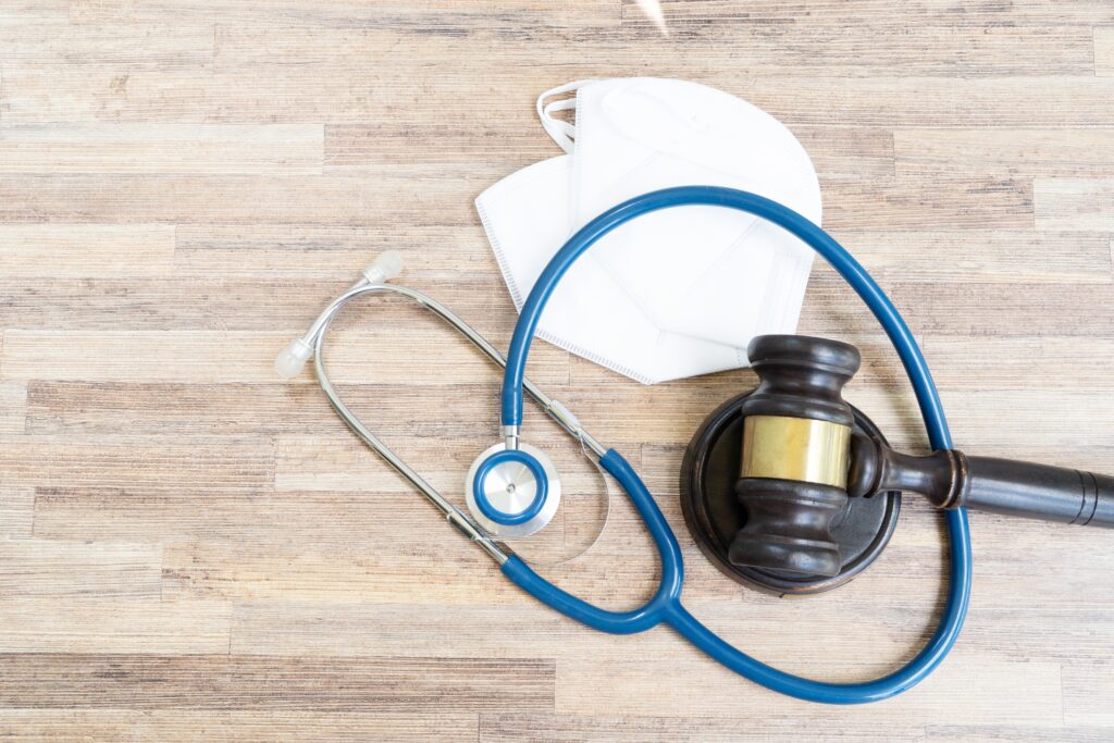 Patient consulting lawyer about surgical error malpractice case.
